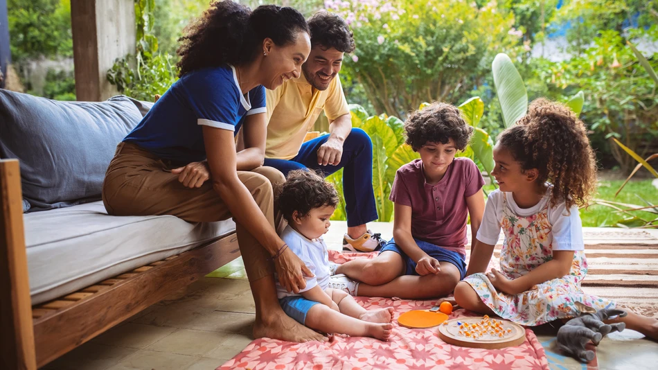 family-playing-patio-novonesis
