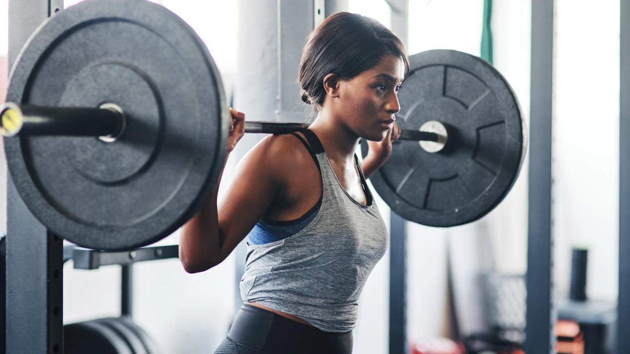 Woman lifting weights to stay ahead