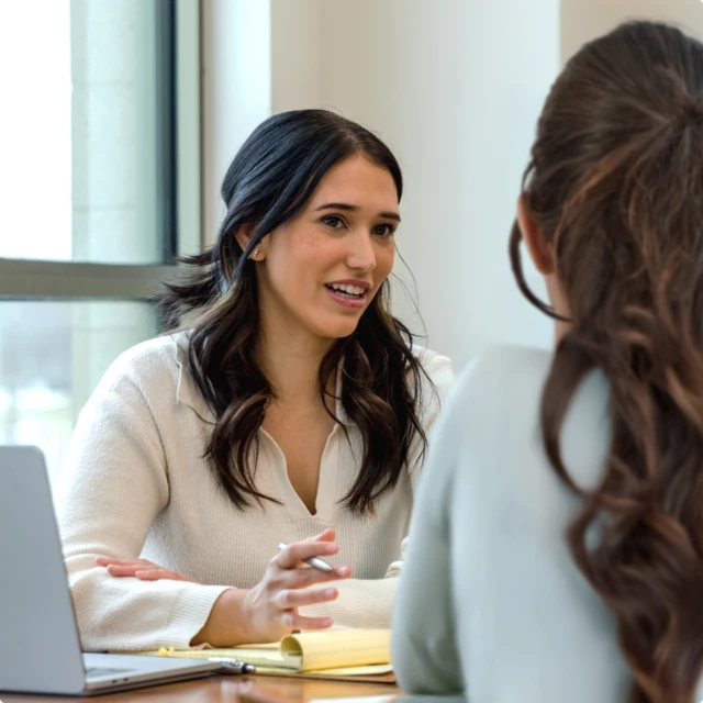 Woman interviewing another woman