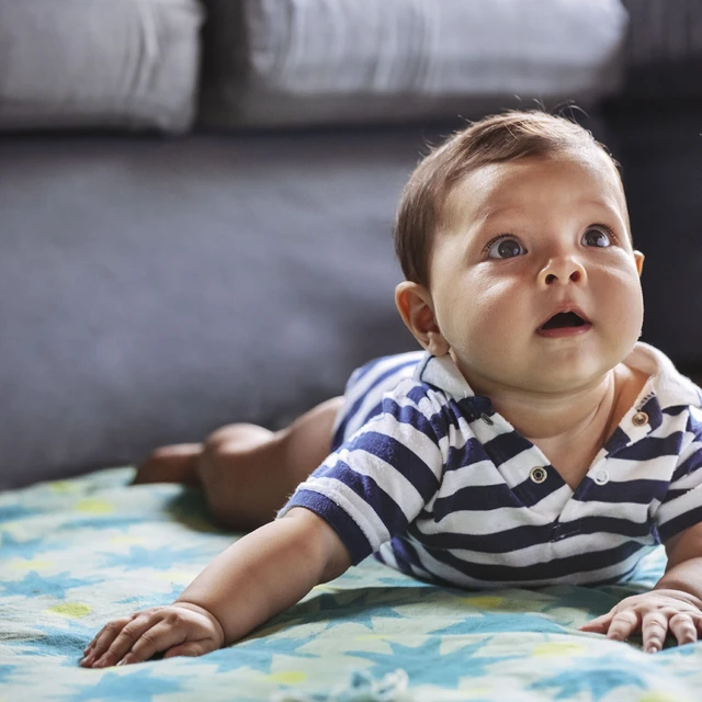 baby on blanket