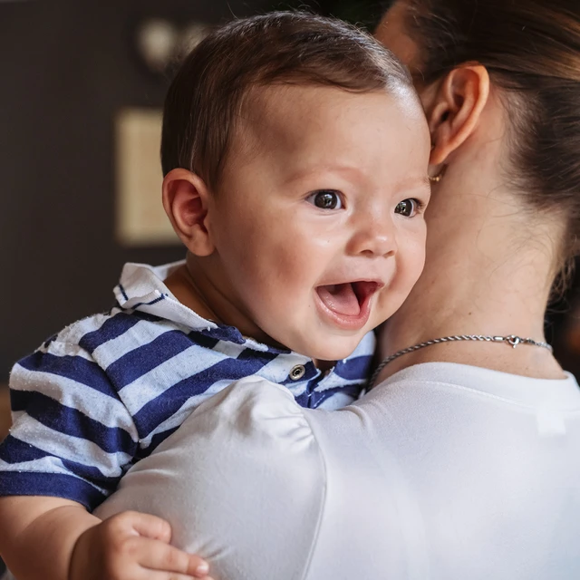 mother baby smile