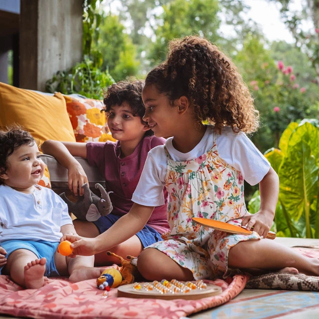 siblings playing