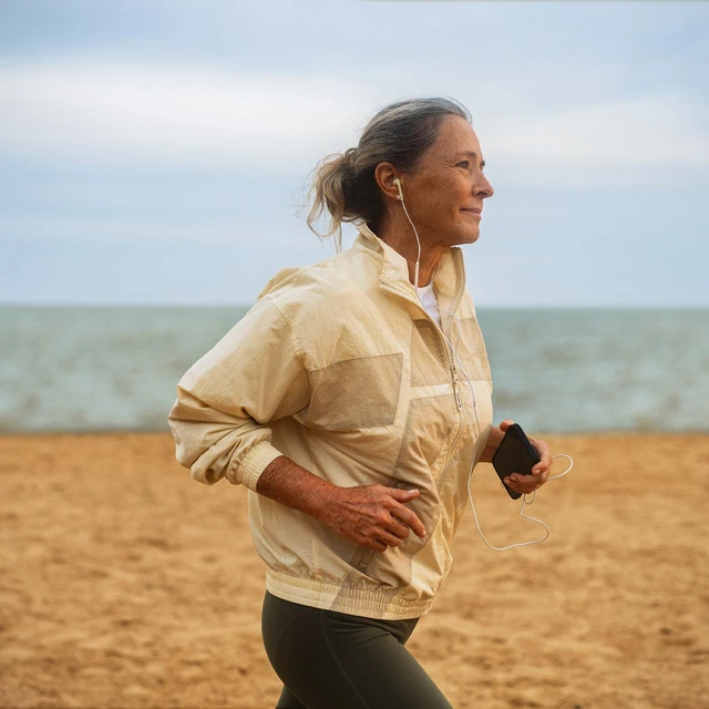 Woman running on beach