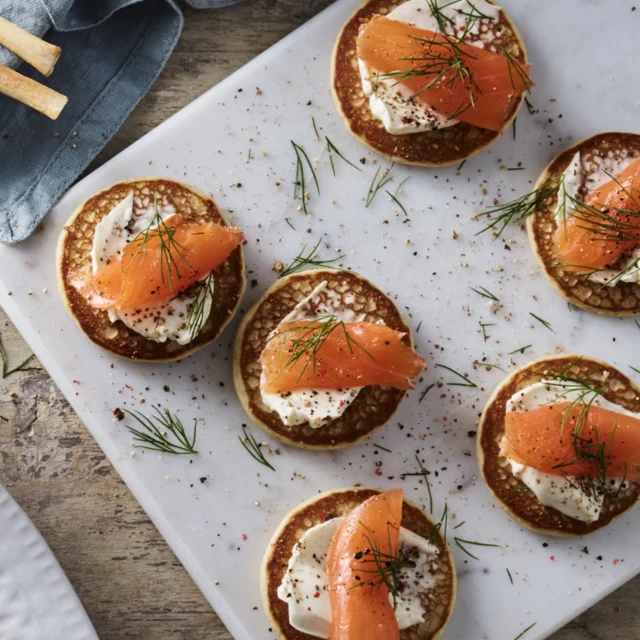 Salmon on blinis