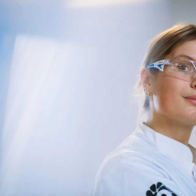woman lab in freezer tank