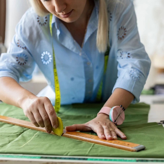 woman-tailor-textile-GettyImages-2258643255