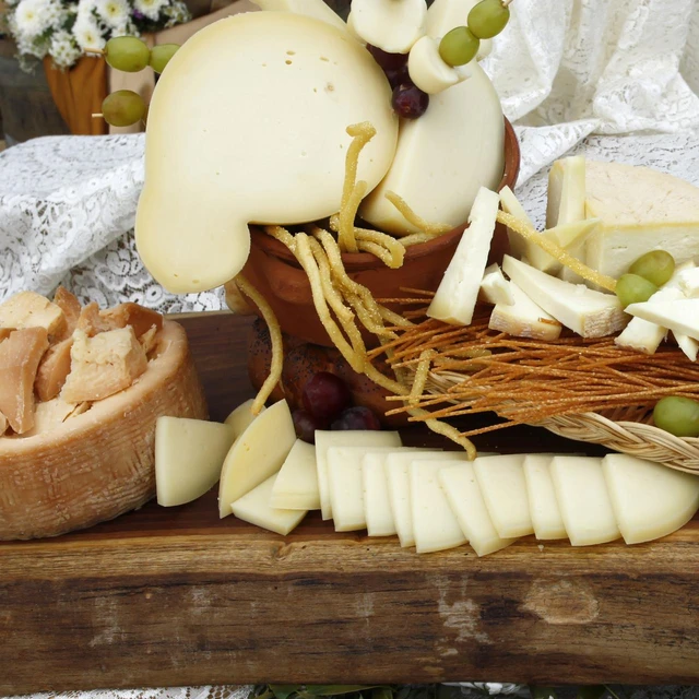 Aged cheese in a basket on a table