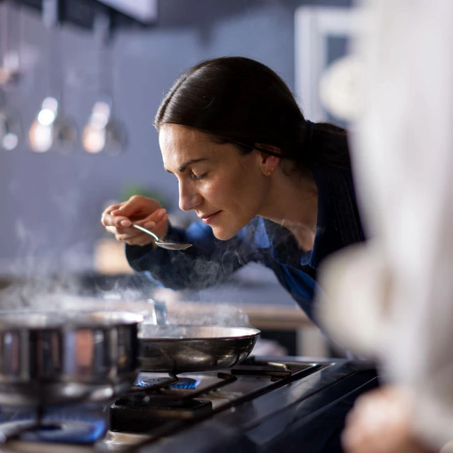 Woman tasting a recipe for Insights