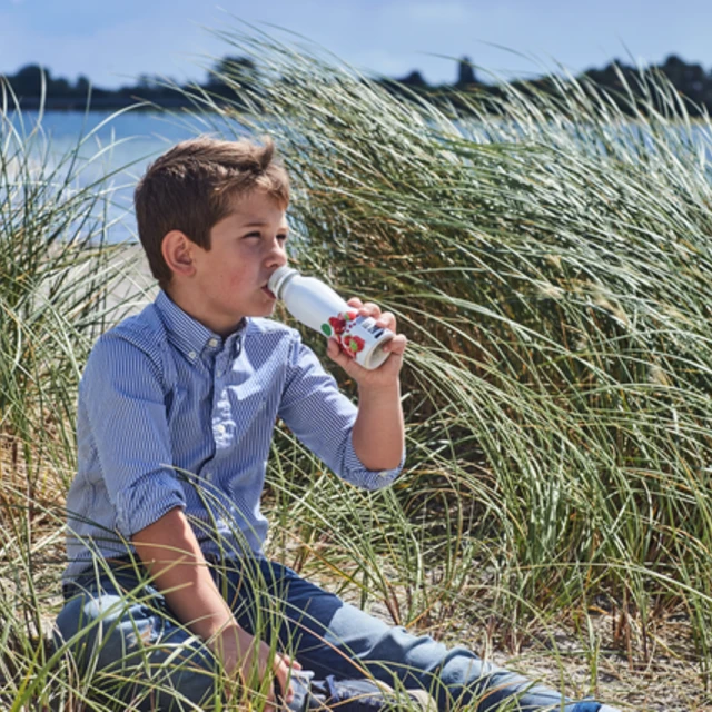 Boy drinking yogurt