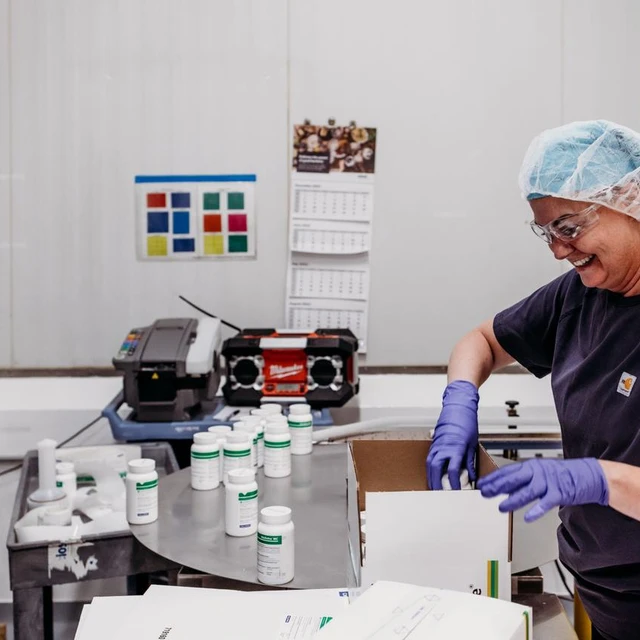 woman-bottles-lab-melwi-new-berlin-us-novonesis