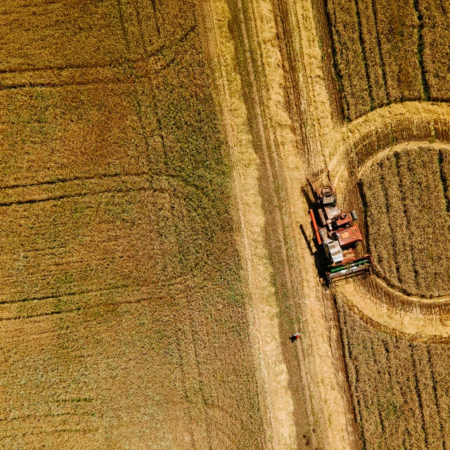 drone view of a field with a tracker on the field