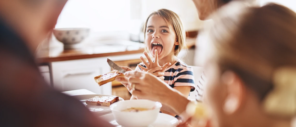 Girl eating bread