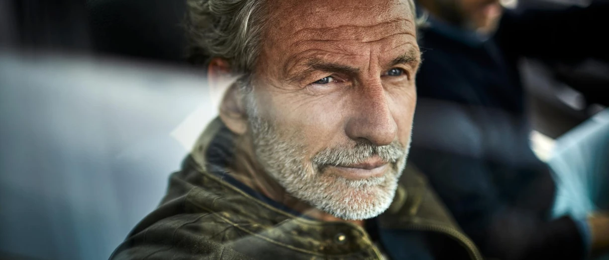man in car