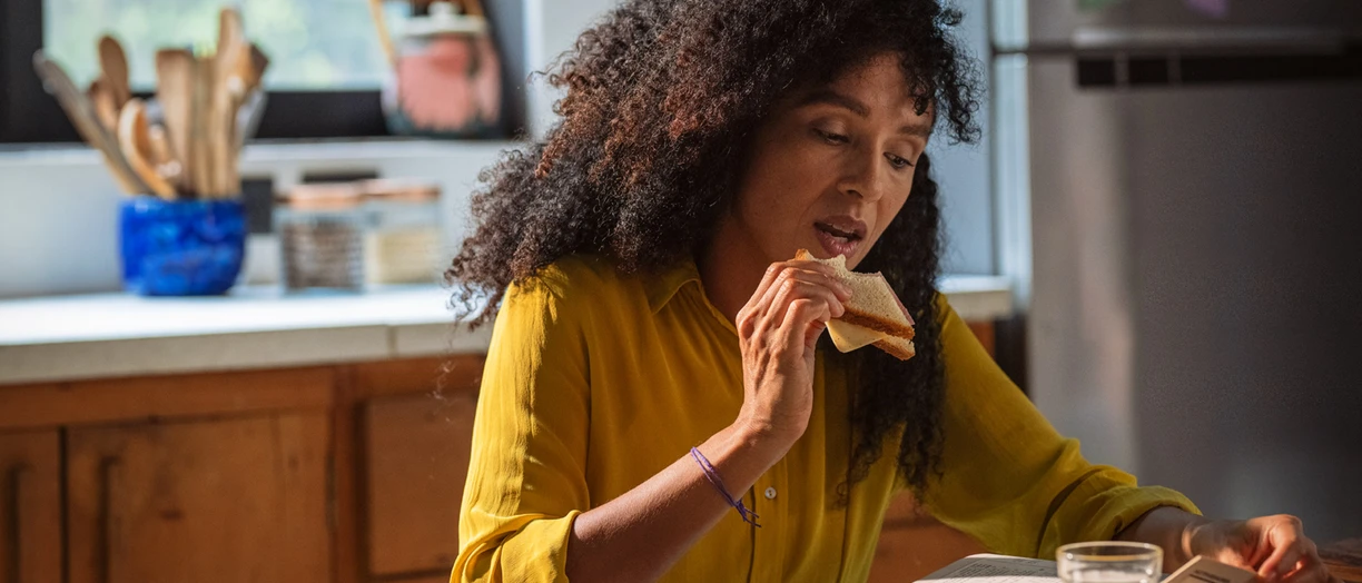 woman eating sandwich