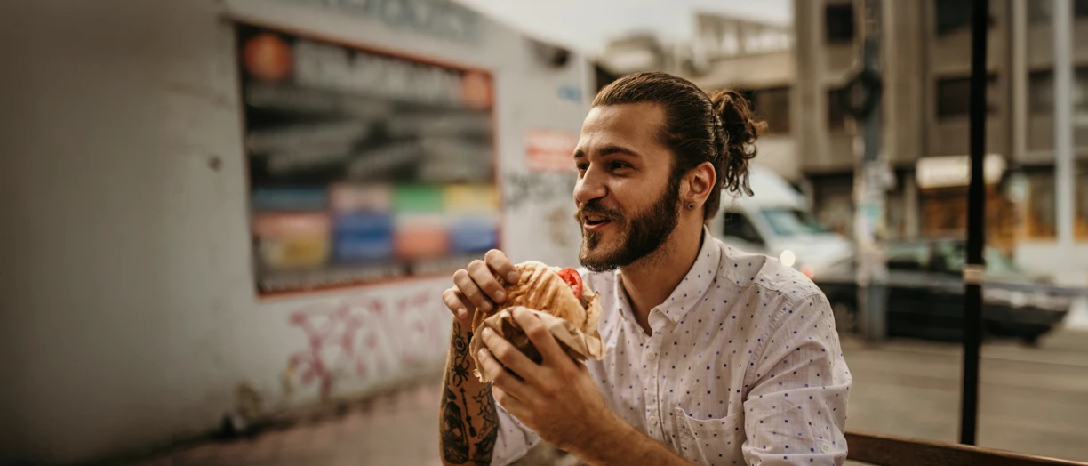 Man eating burger