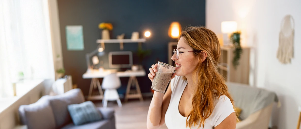 woman drinking cold coffee