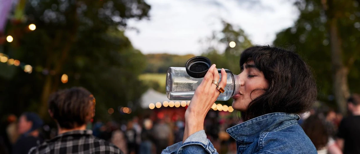 woman drinking a shake