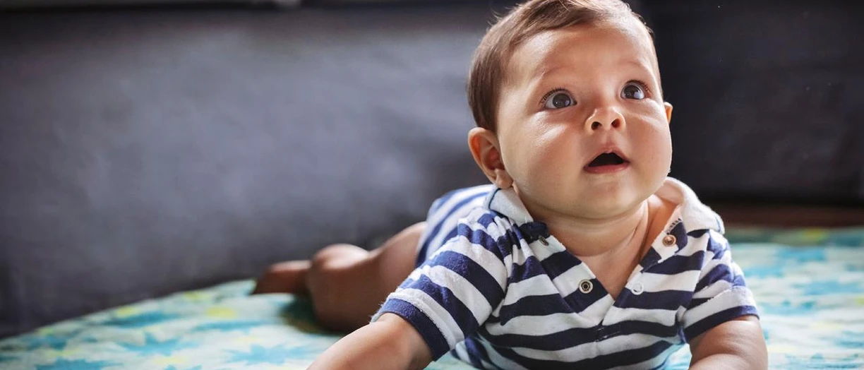 baby on blanket