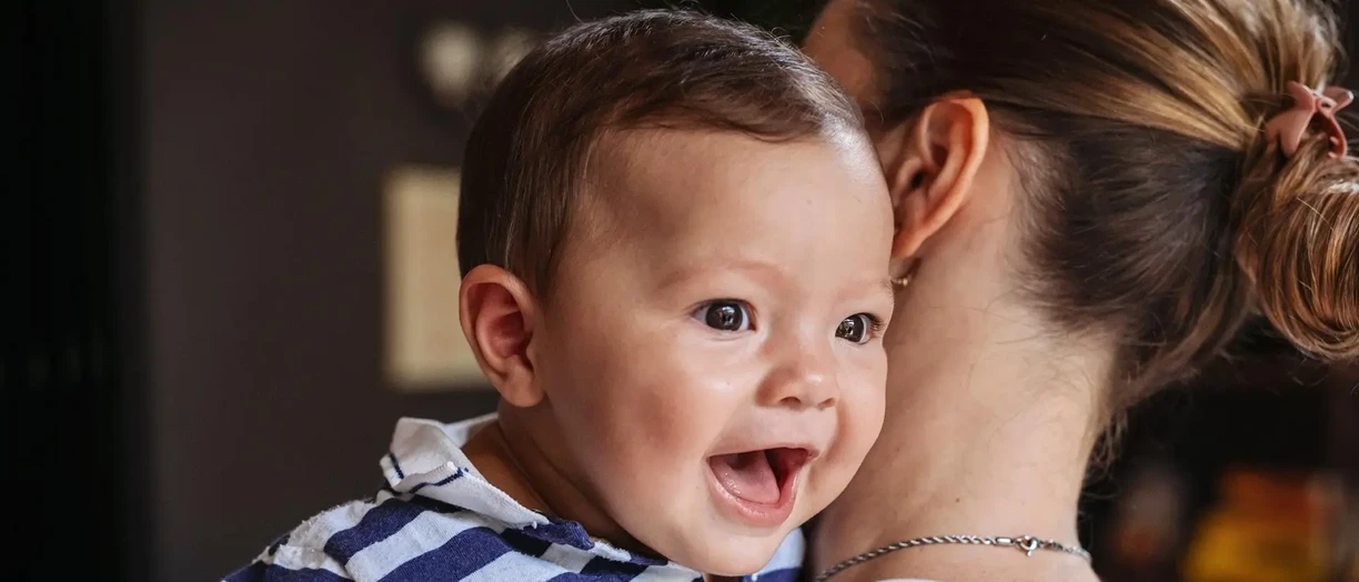 mother baby smile