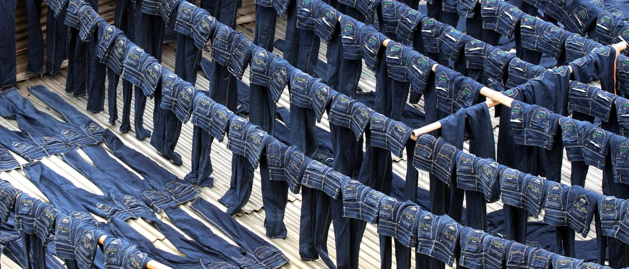 a bunch of jeans hanging outdoor