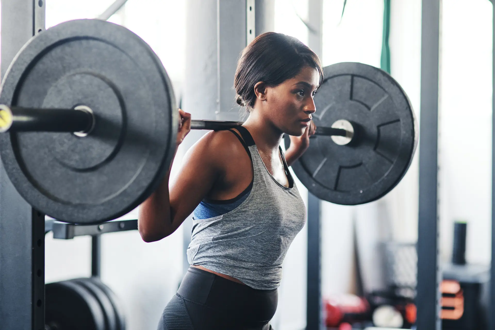 Woman lifting weights to stay ahead