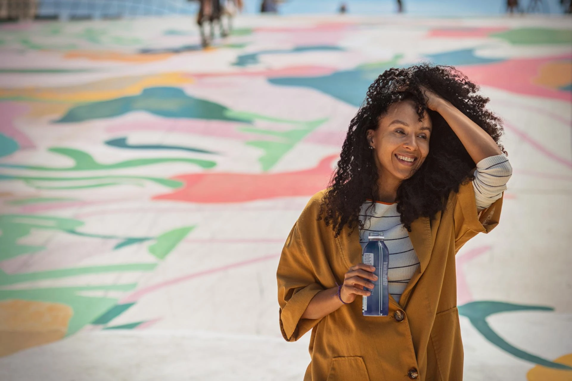 woman-drinking-yoghurt-outside