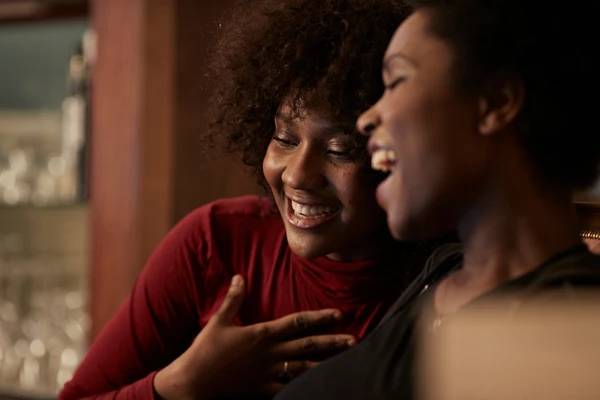 Two women smiling