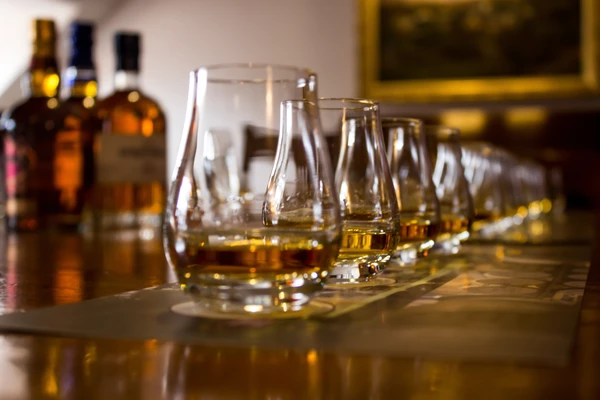 Whisky lined up inside distillery