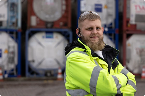 Man in yellow vest in industry