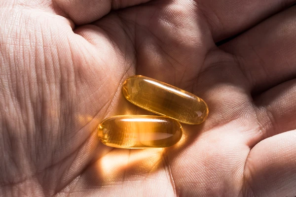 Two Soft Capsules in Palm