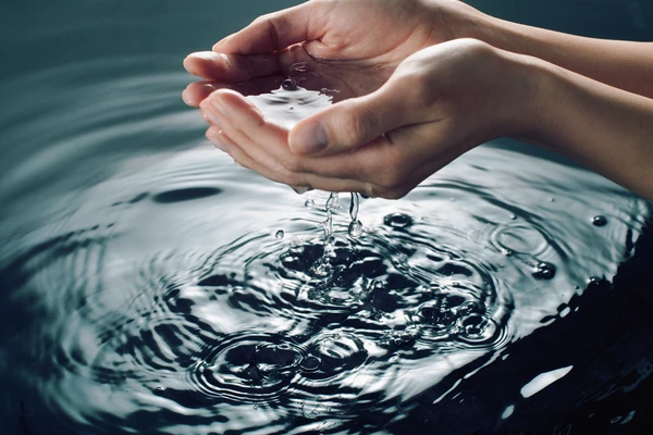 Holding water in cupped hands