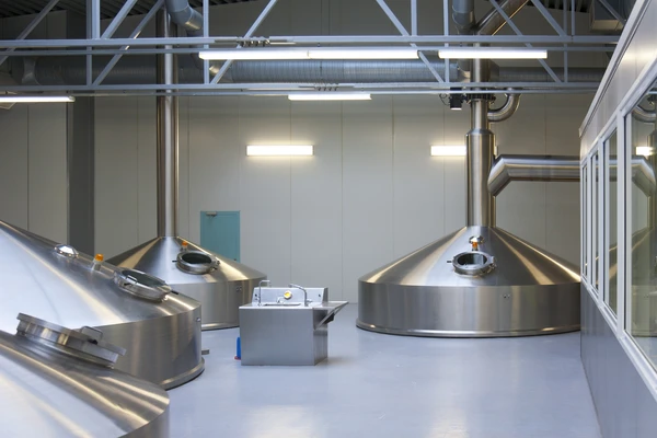 Interior of brewery large steel tanks