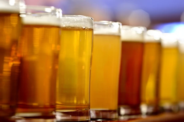 Row of different types of beer closeup