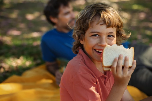 Boy with sandwich
