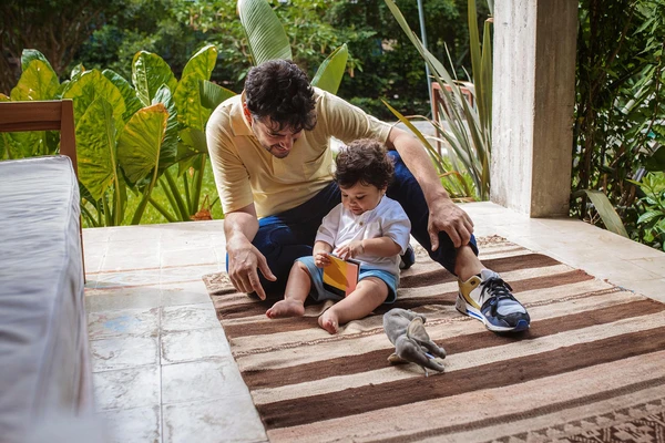 father and child playing