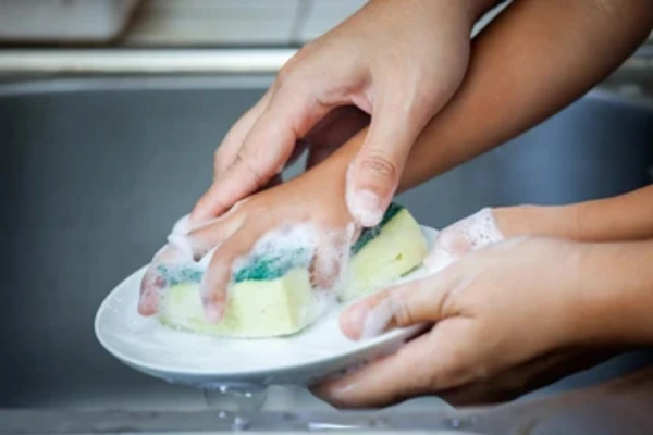 hand washing dishes