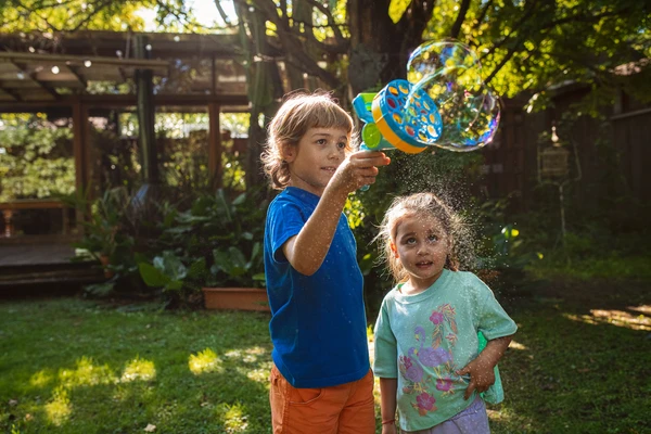 siblings playing