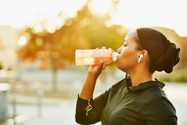 woman drinking juice