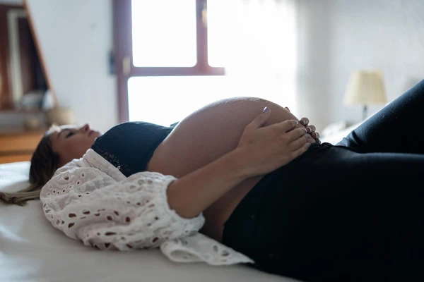 Pregnant-on-bed