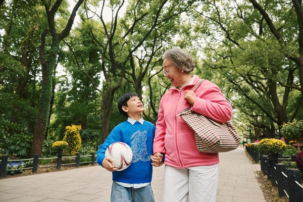 grandmother-grandson-walking-park-002-novonesis