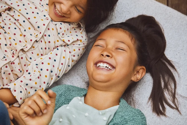 two children laughing