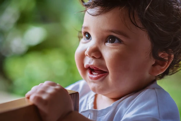 babyboy smilling with teeth