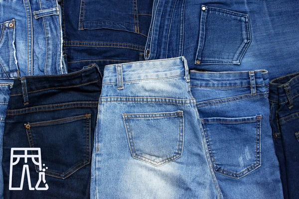 a lot of jeans placing together