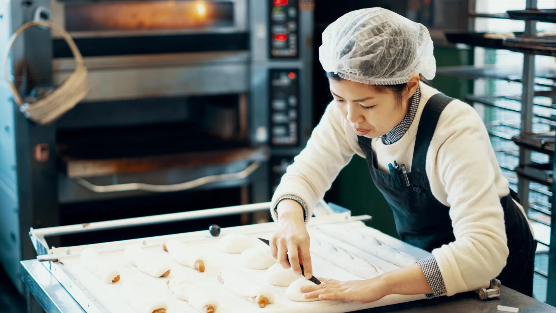 Woman preparing buns 