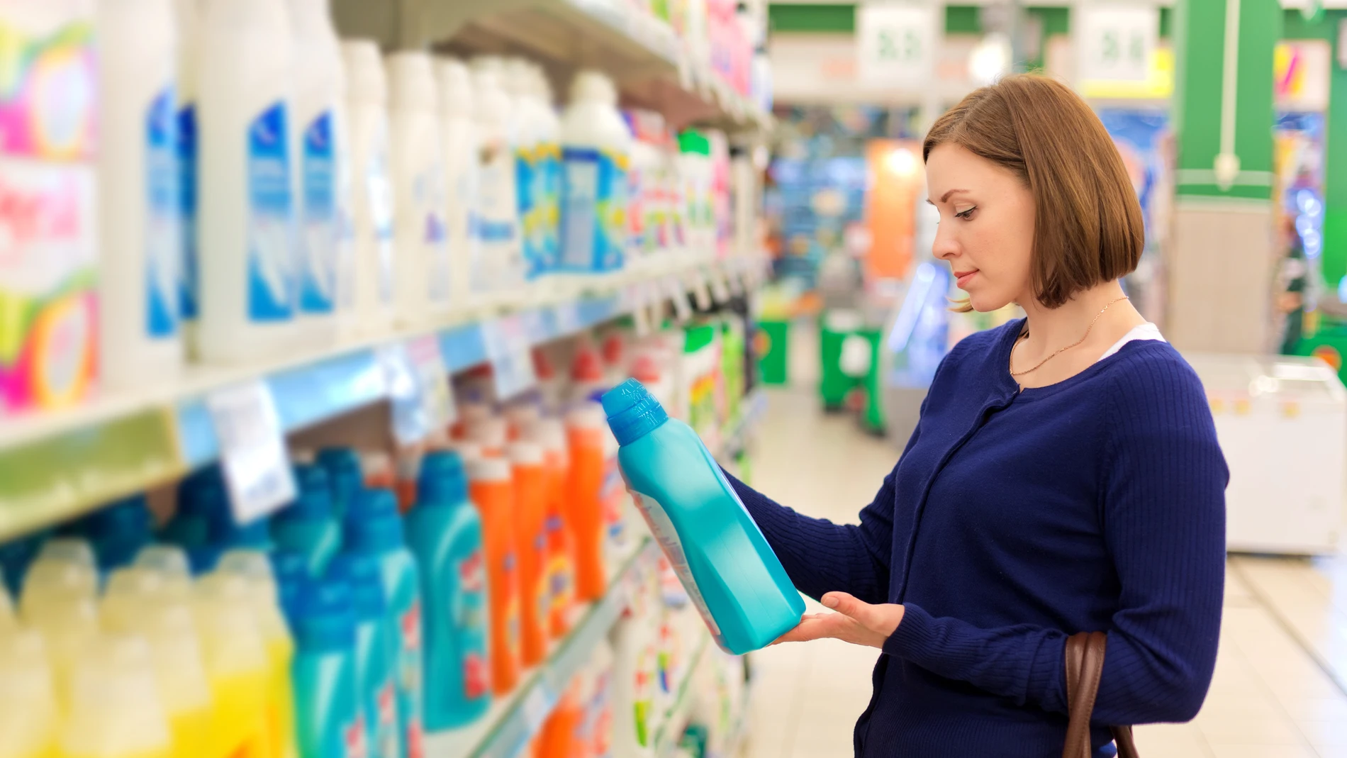 woman looking at detergents