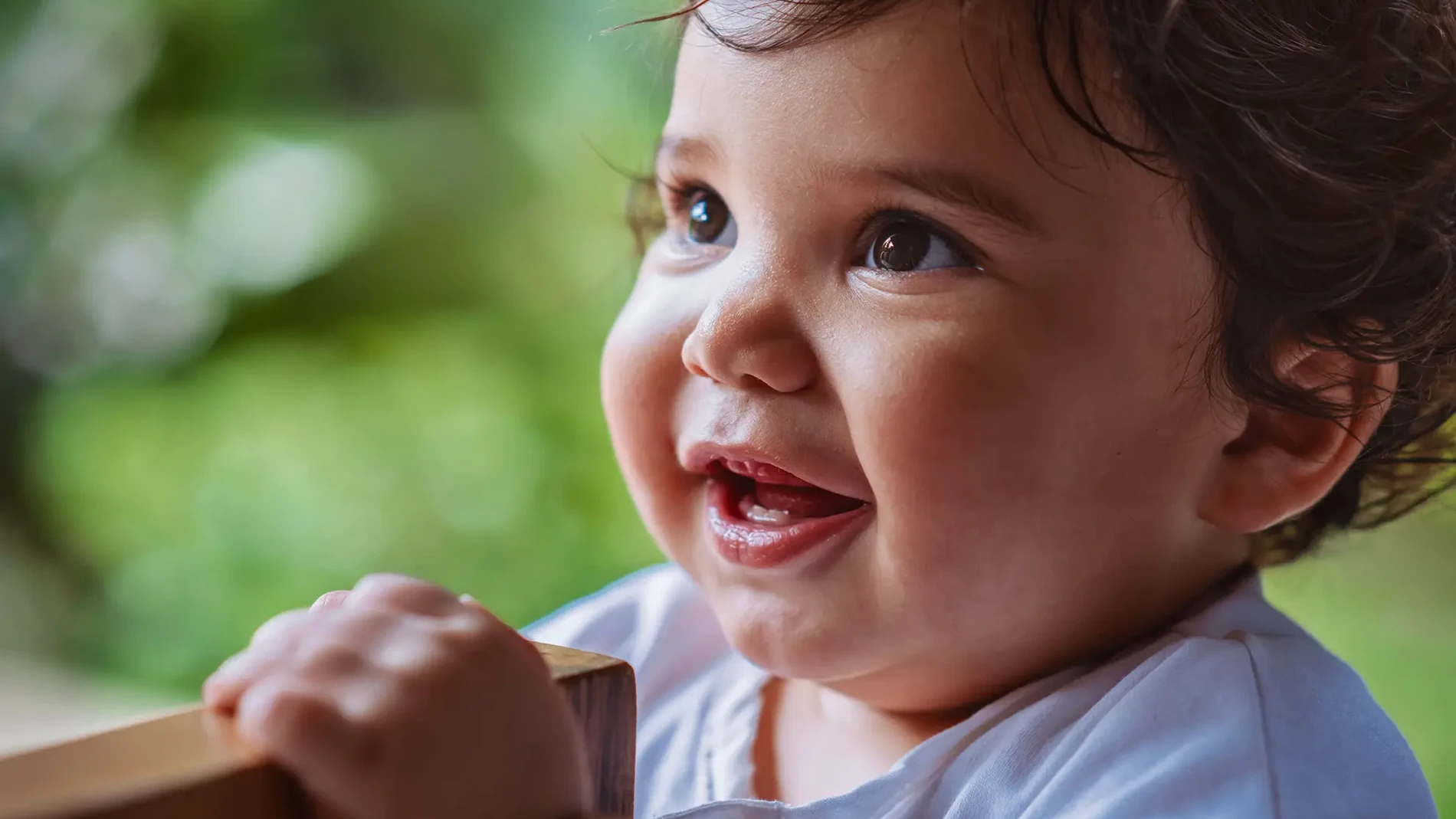 babyboy smilling with teeth
