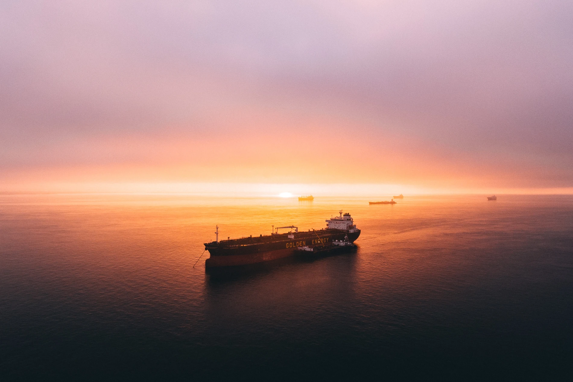 Old cargo ship traveling with goods