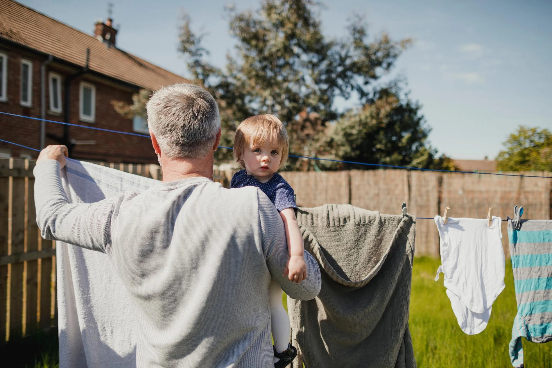 man holding child