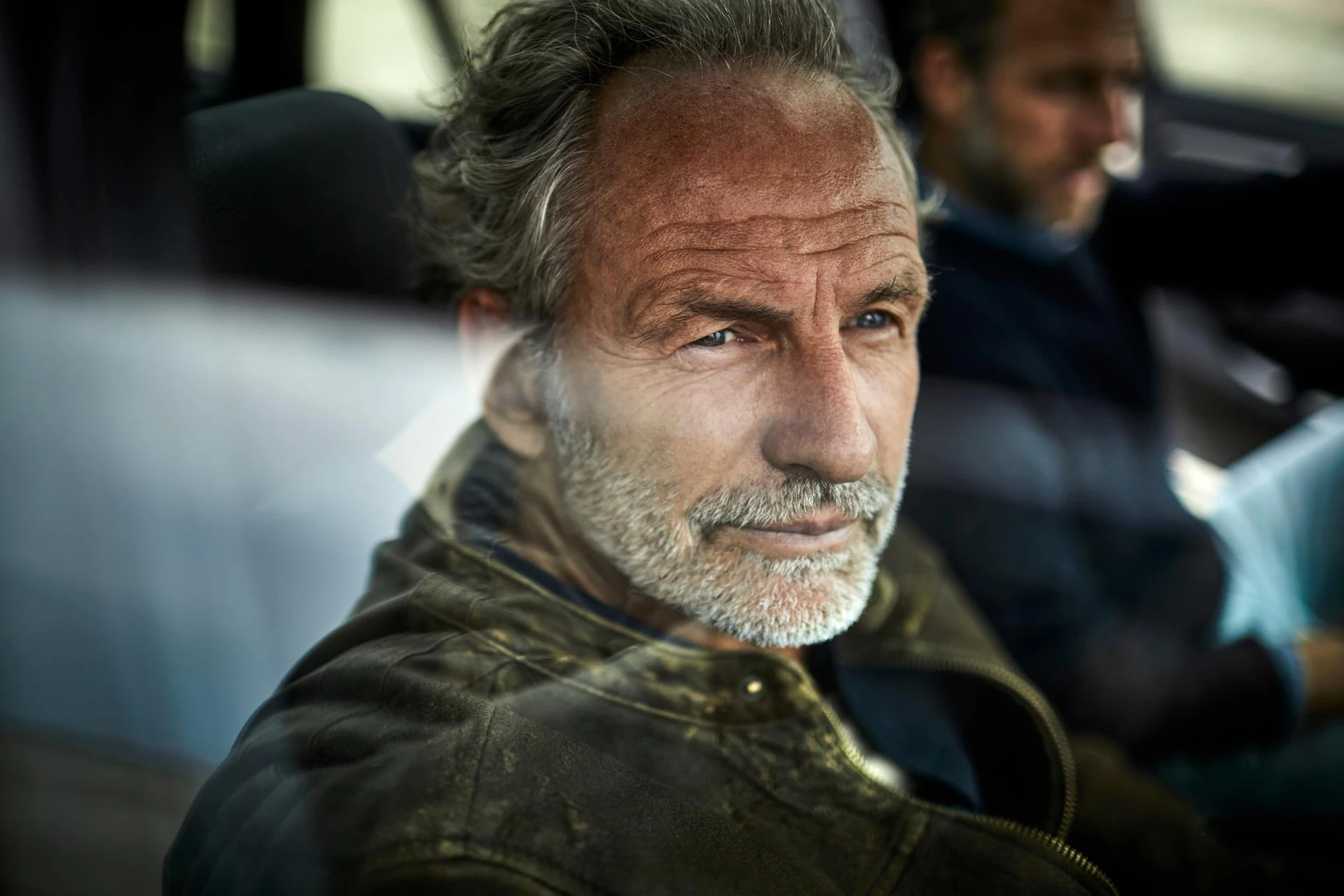 man in car