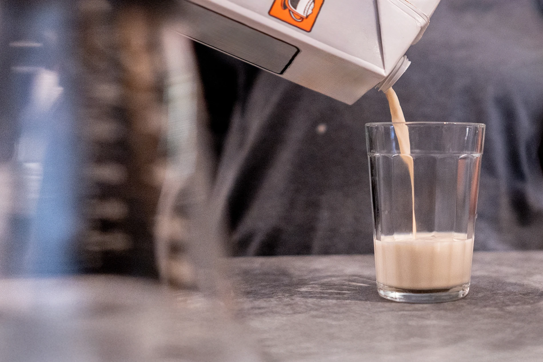 pouring almond milk